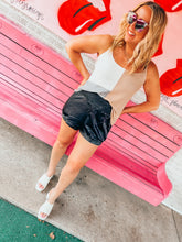 Load image into Gallery viewer, Black satin smocked shorts
